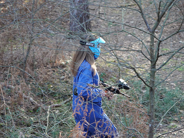 Children wearing full protective gear playing low-power paintball near Overijse